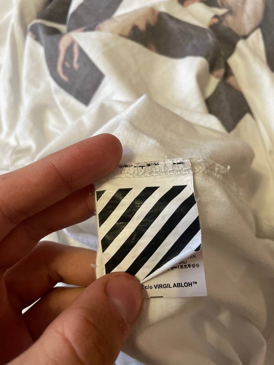 OFF WHITE CARAVAGGIO ARROW