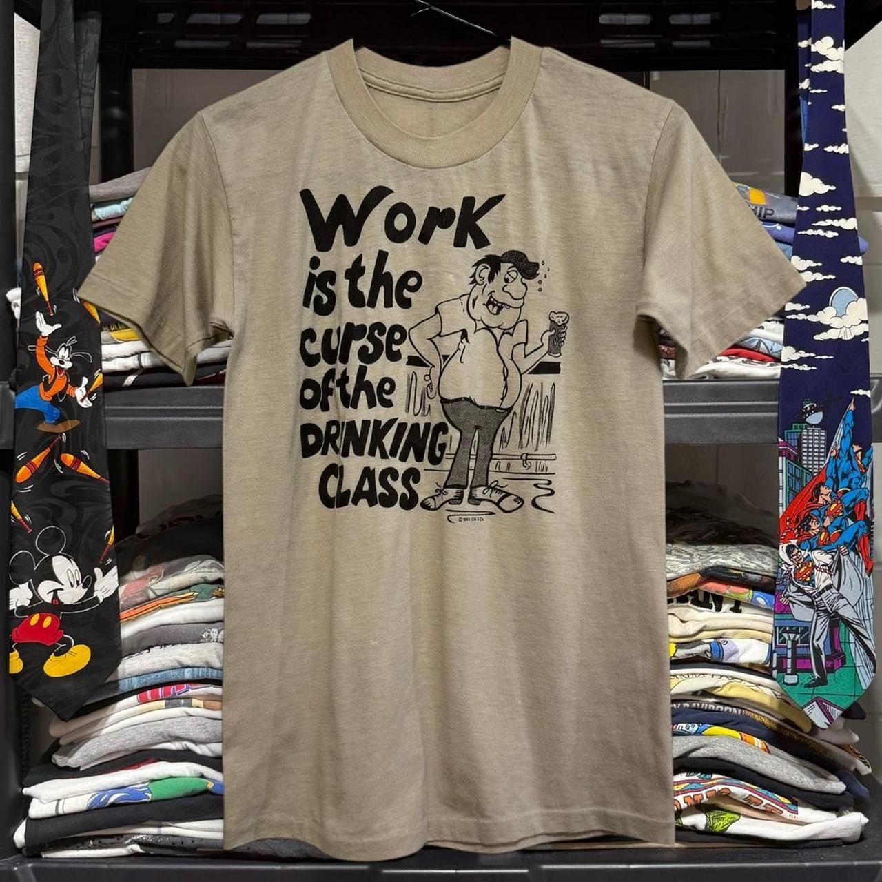 Work is the Curse of the Drinking Class Men’s T-Shirt Tan Size L 80s Funny Quote