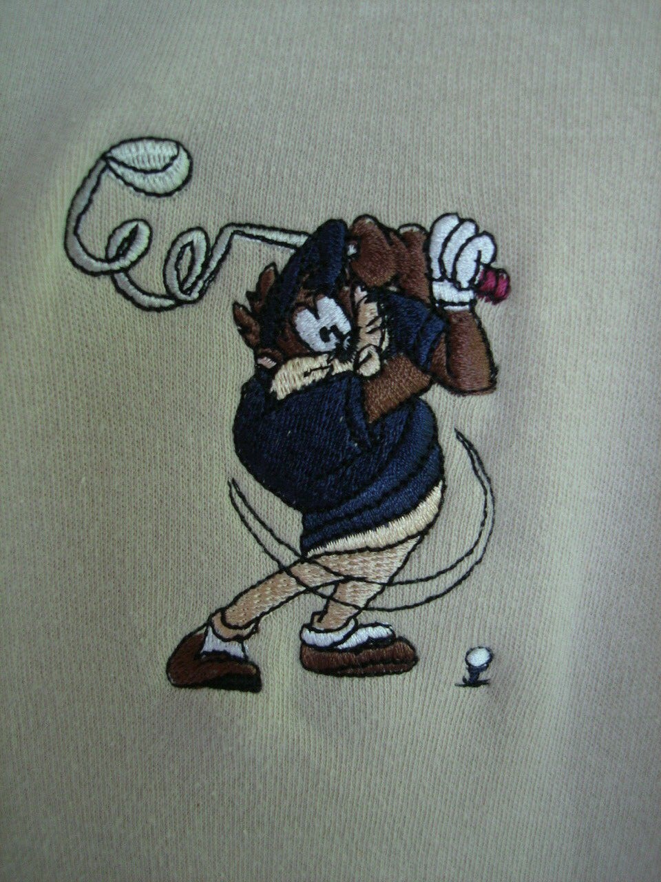 NWT WARNER BROS. TAZ “DRIVING ME CRAZY” BEIGE 100% COMBED COTTON S/S POLO SZ. S