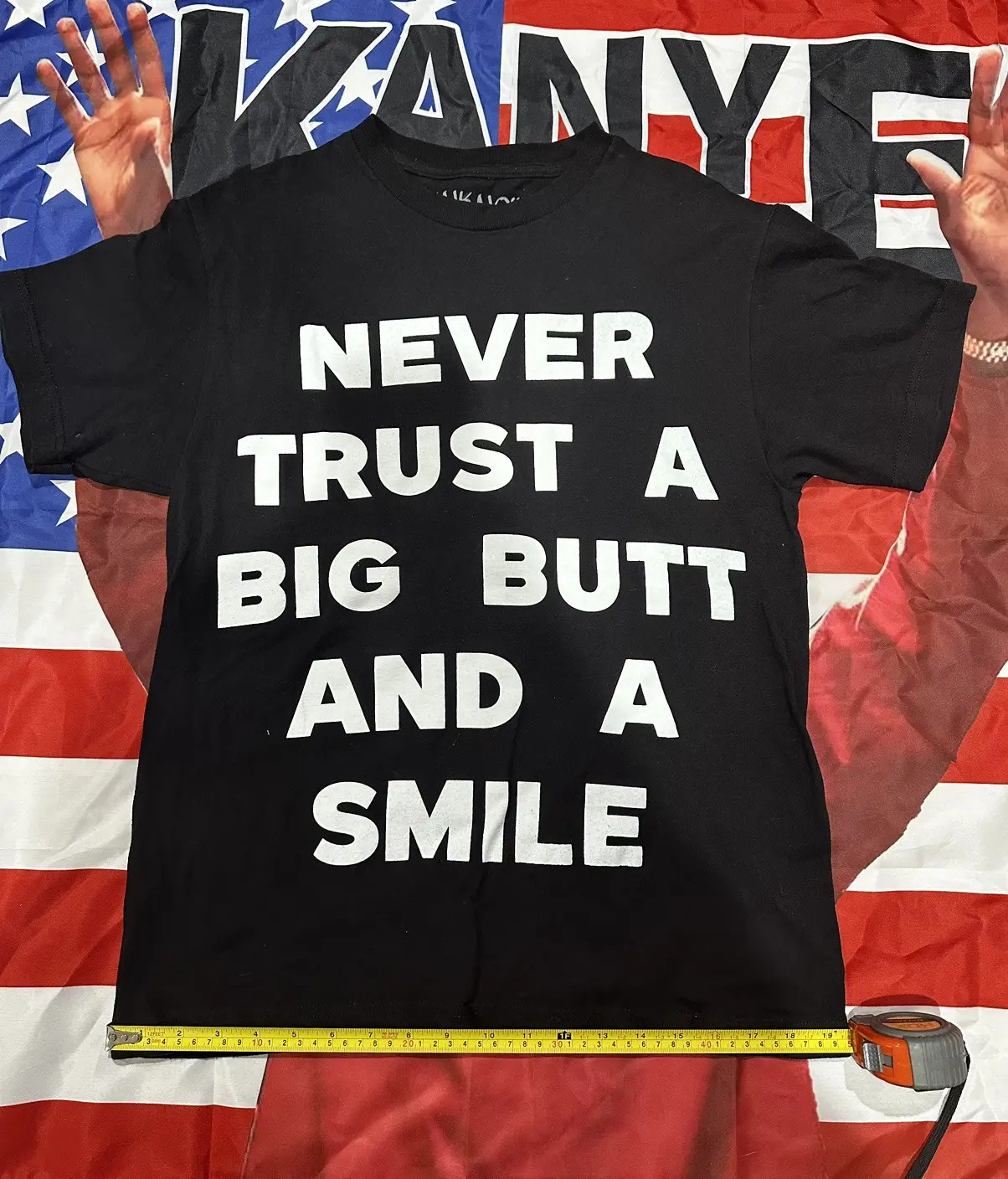 unknown clothing “never trust a big butt and smile “ tee