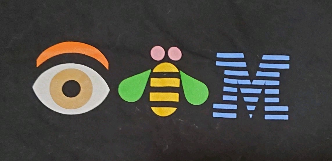 Vintage Black Large IBM “Eye Bee M” Computers Recycled Material District T-shir