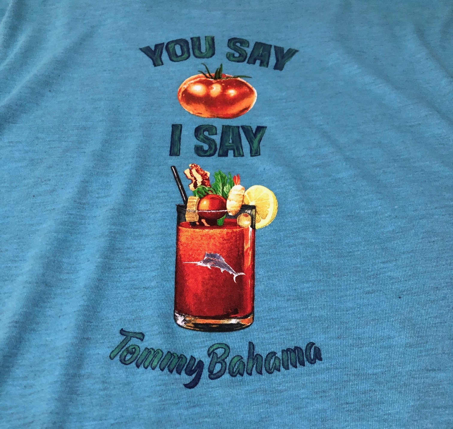 NWT TOMMY BAHAMA “S” MENS TURQUOISE HAZE HEATHER YOU SAY TOMATO ” TEE $ 49.50